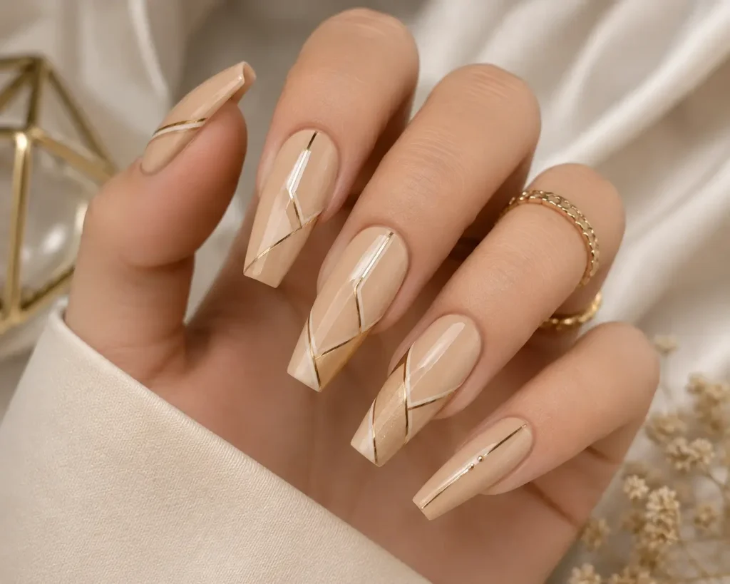 Beige and Gold Geometric Nail Design