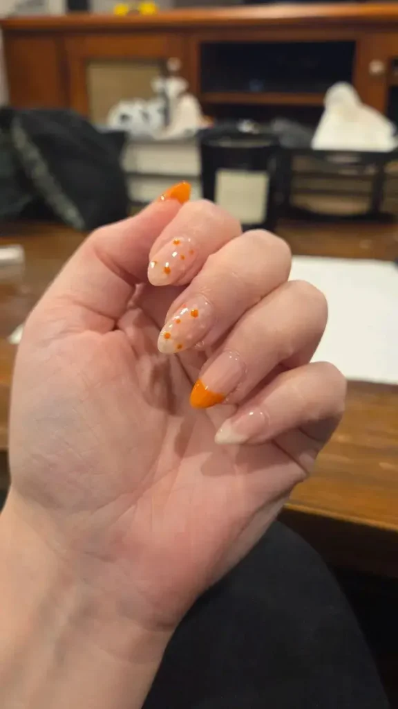 Orange French Tip Nails With Design