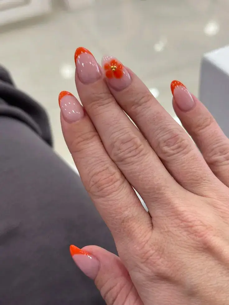 Orange French Tip Nails With Flowers